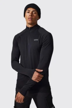 Promos Coutuvelle Magasin 28 Top De Running à Col Zippé - MAN Active